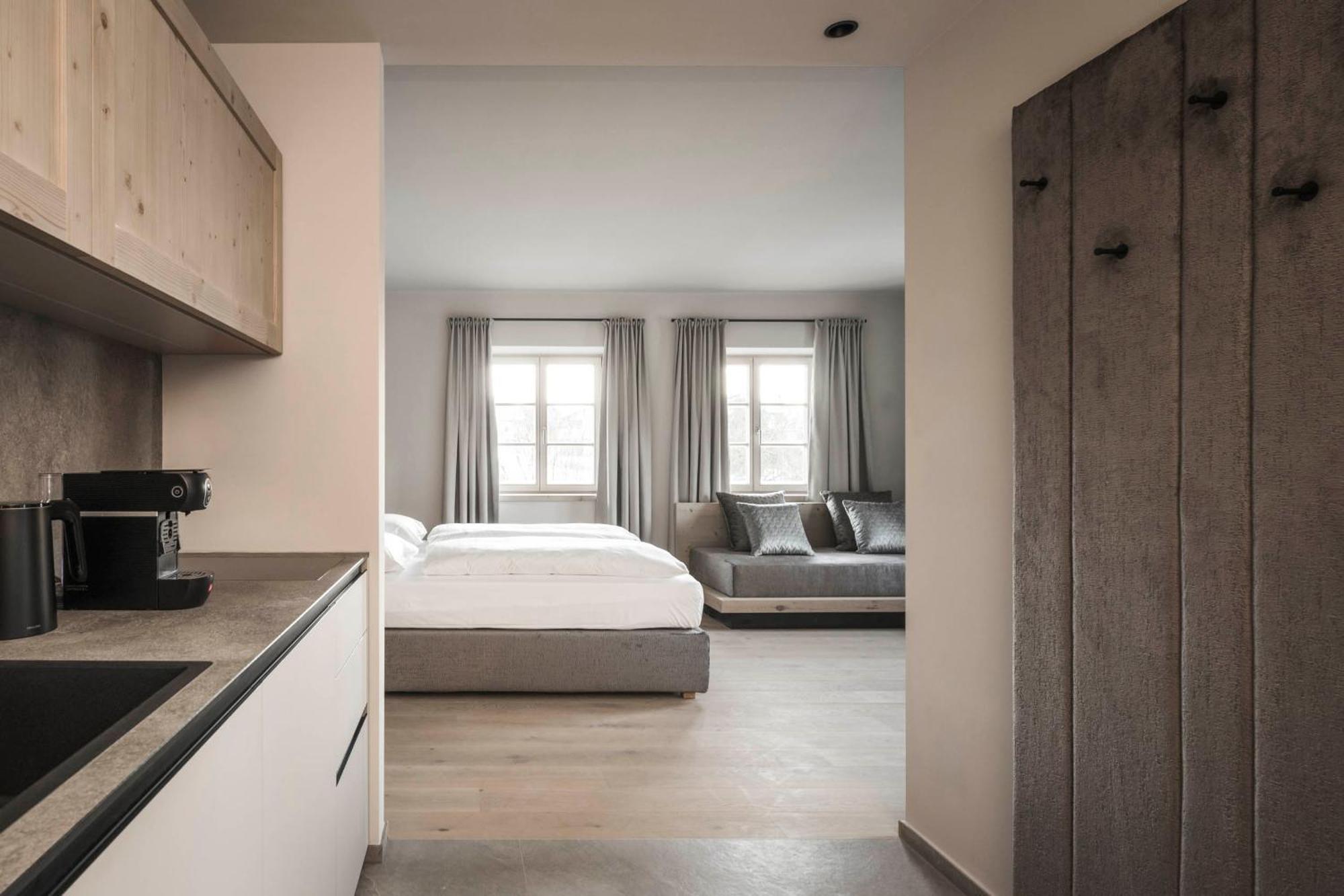 Hofergut Suites & Apartments Riscone Bagian luar foto