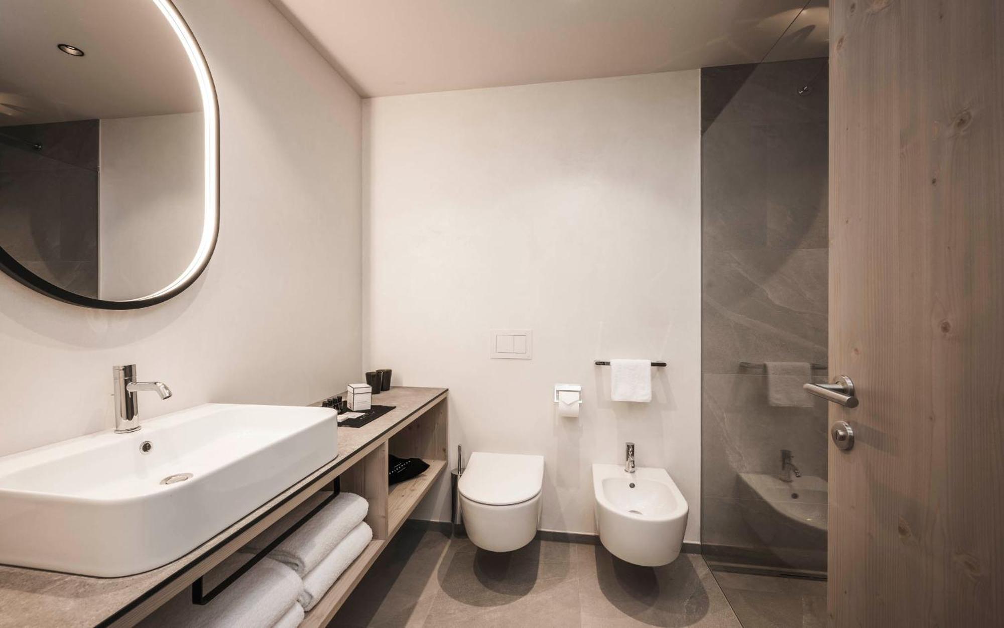 Hofergut Suites & Apartments Riscone Bagian luar foto
