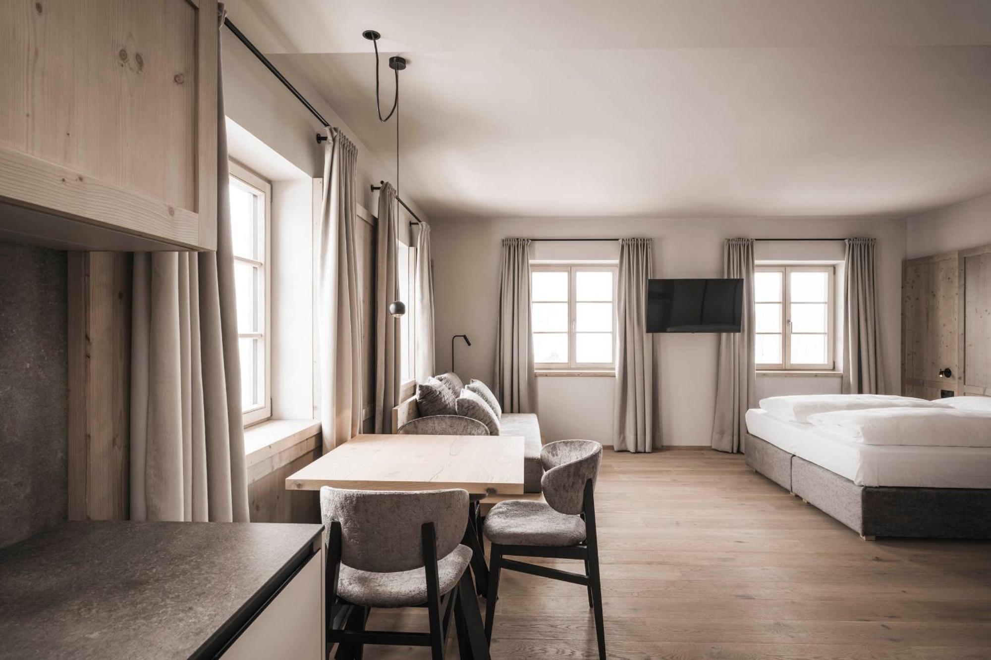 Hofergut Suites & Apartments Riscone Bagian luar foto